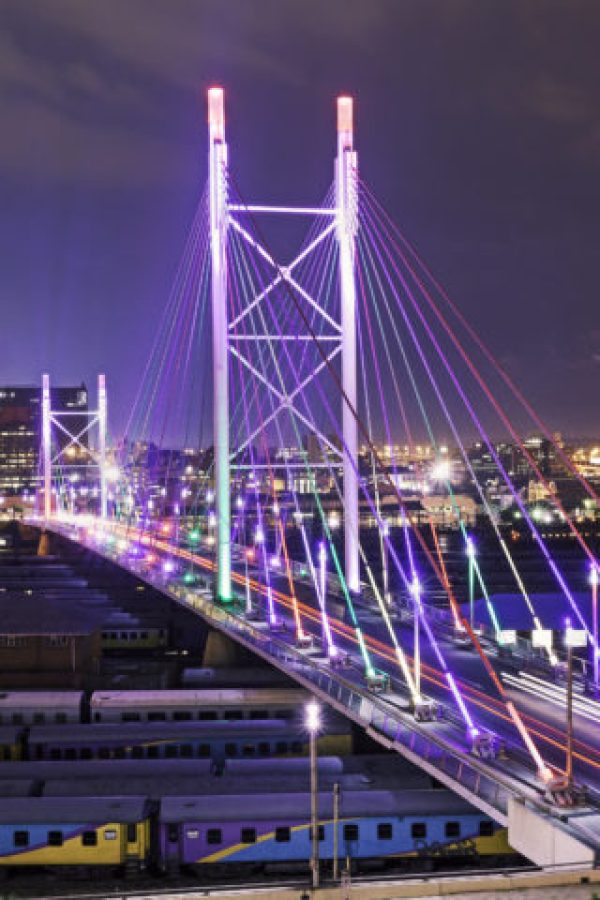 Multicolored lighting on Nelson Mandela Bridge in Johannesburg city.